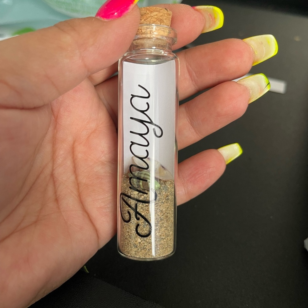 Small glass bottles with cork stopper